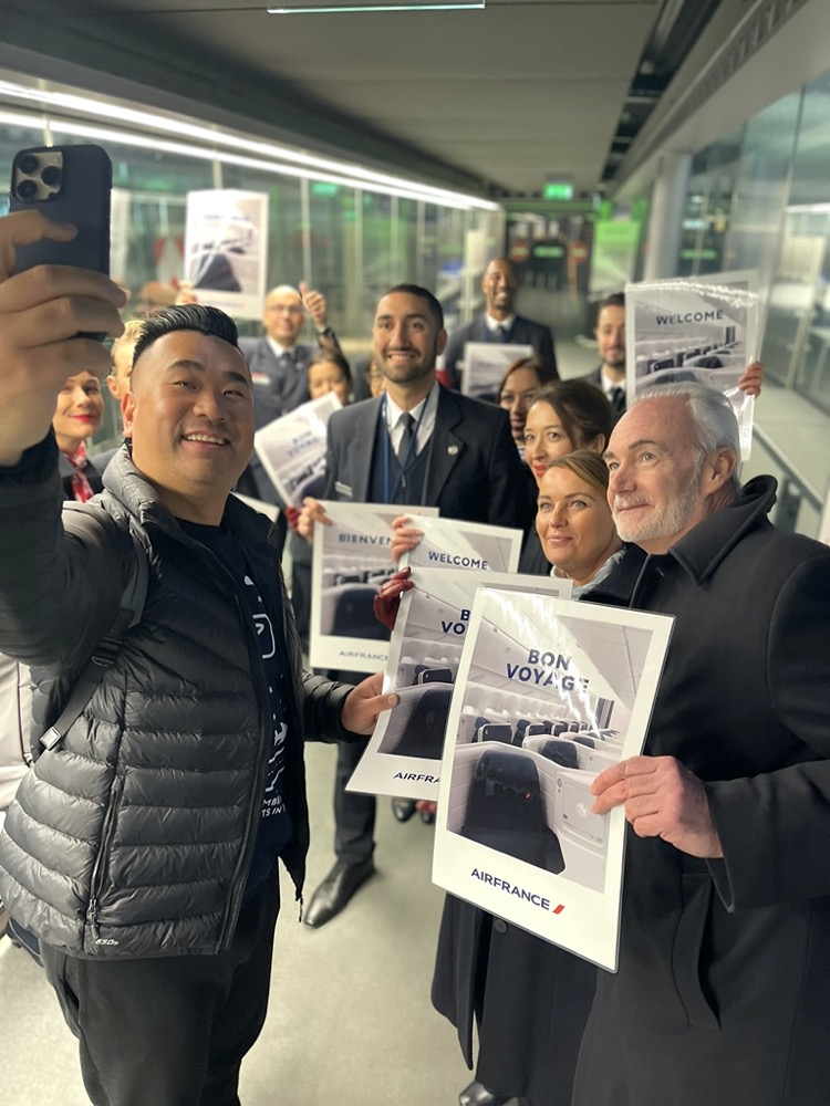 a group of people holding signs