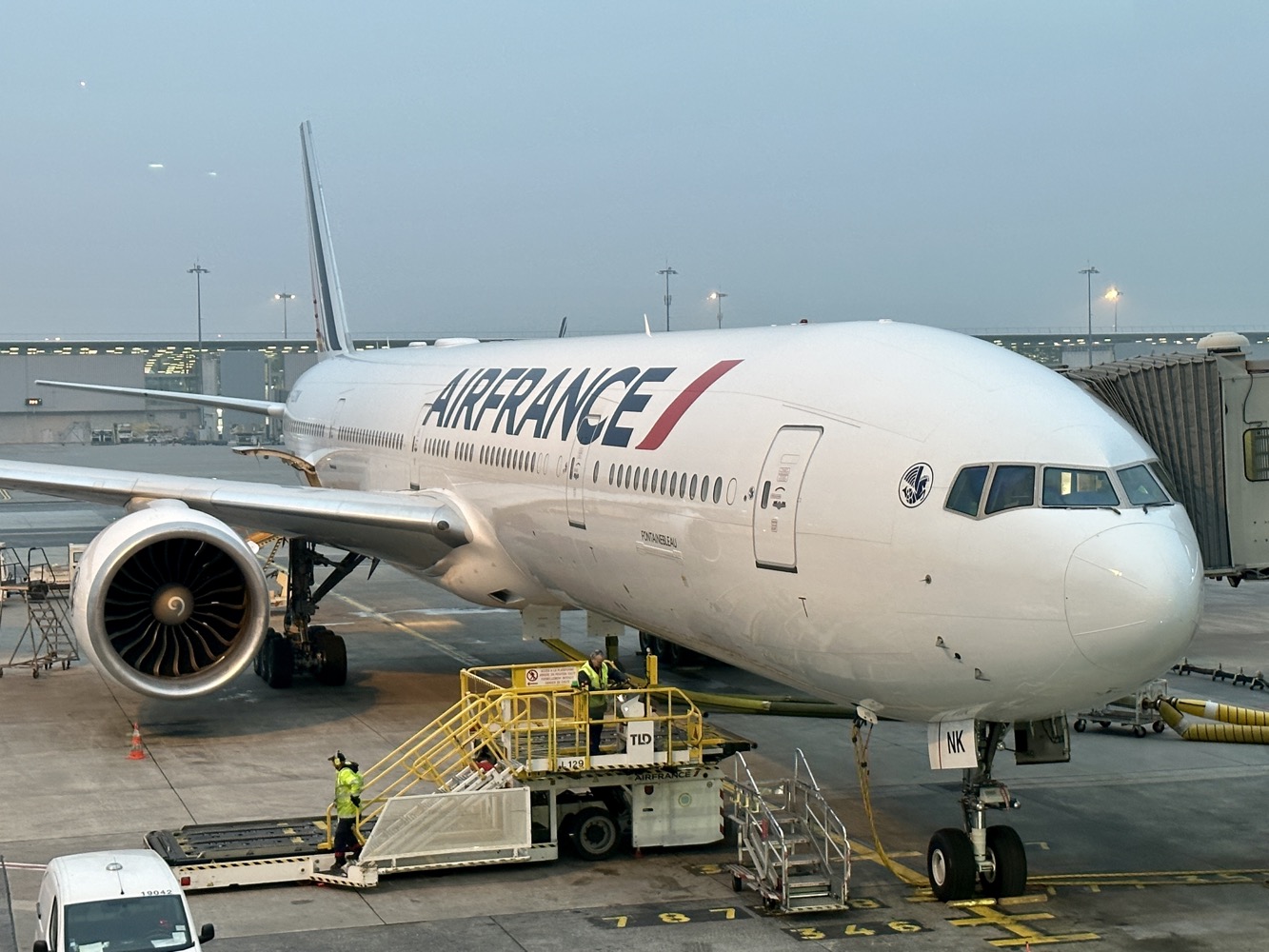 a large white airplane at an airport