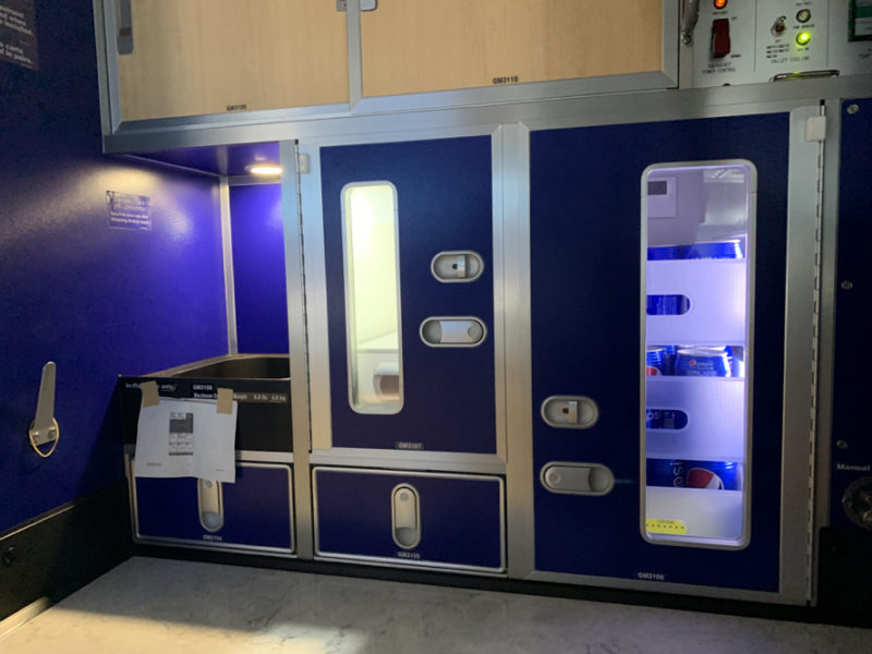 a blue and silver refrigerator