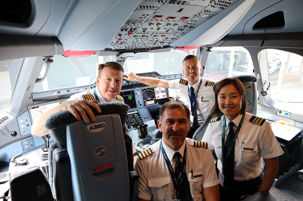 Captain Evan Summerfield, Carl Lucas, F/O Marcin and Dominica Young