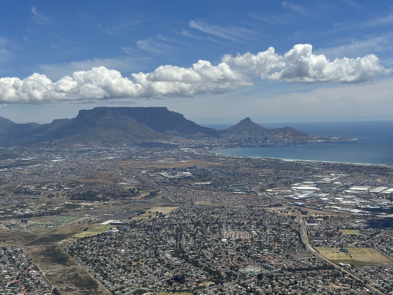 a aerial view of a city and a body of water