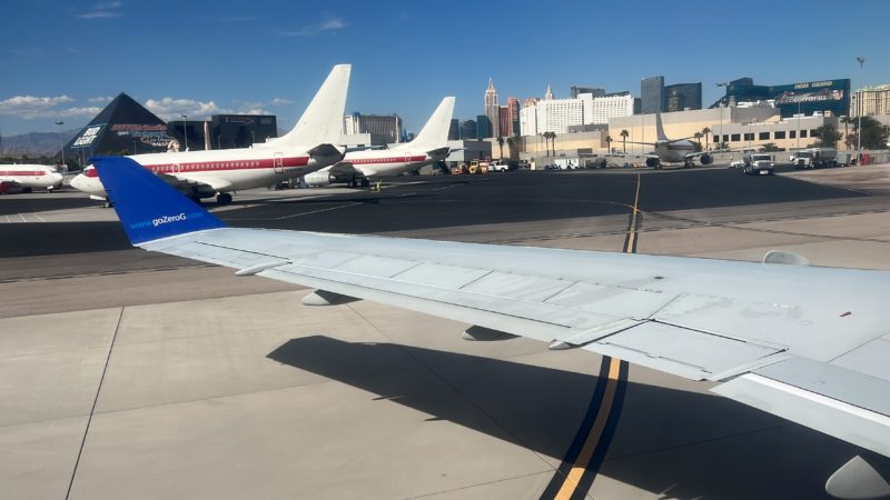 an airplane wing on a runway