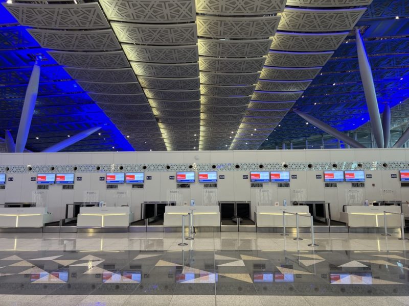 an airport with a check-in counter