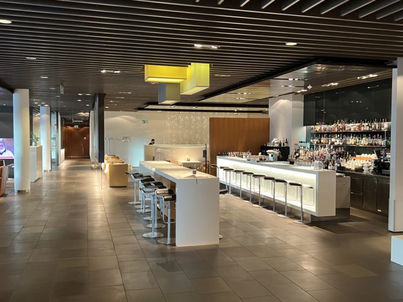 a bar with a counter and bar stools