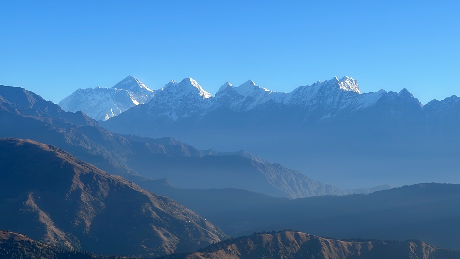 a mountain range with snow on top