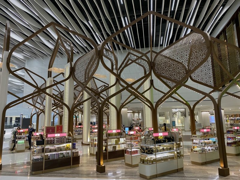 a store with many shelves and a large ceiling