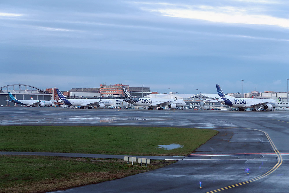 Taxi past the A350-1000 prototype and A330 neo