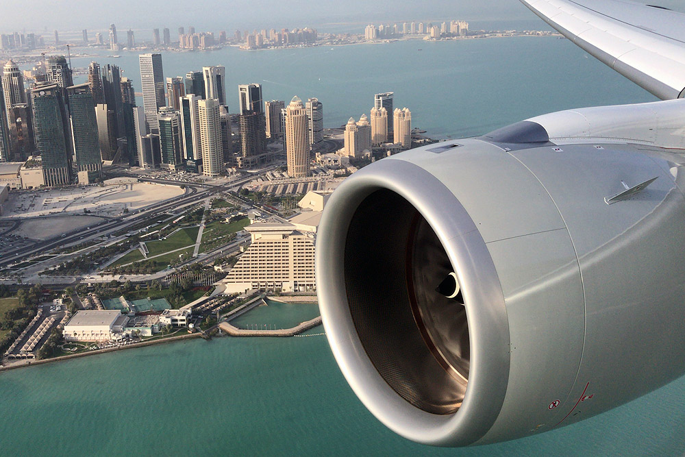 Qatar Airways Airbus A350-1000 flypass Doha skyline