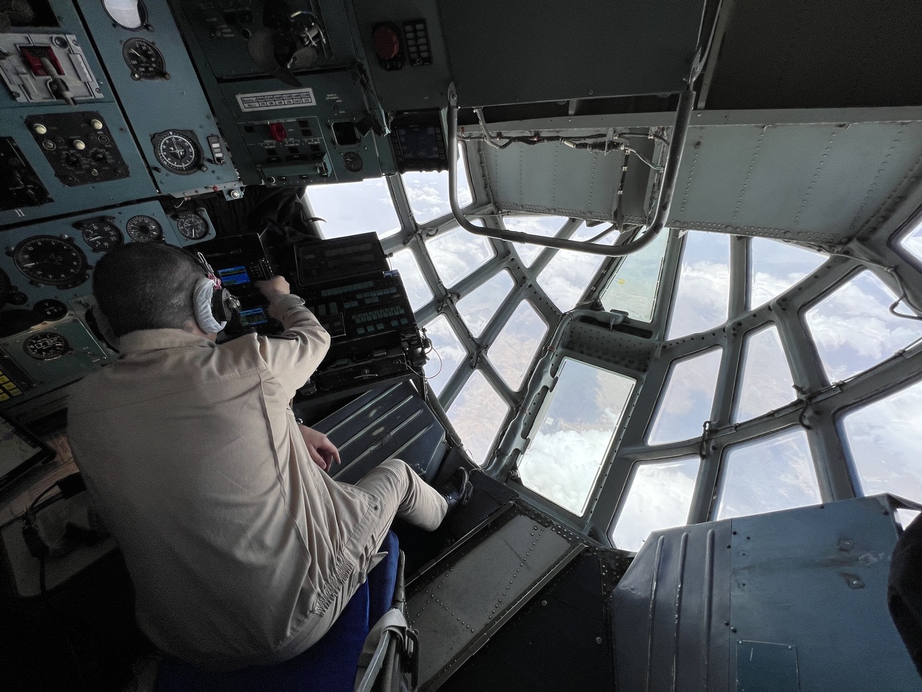 a man in a cockpit