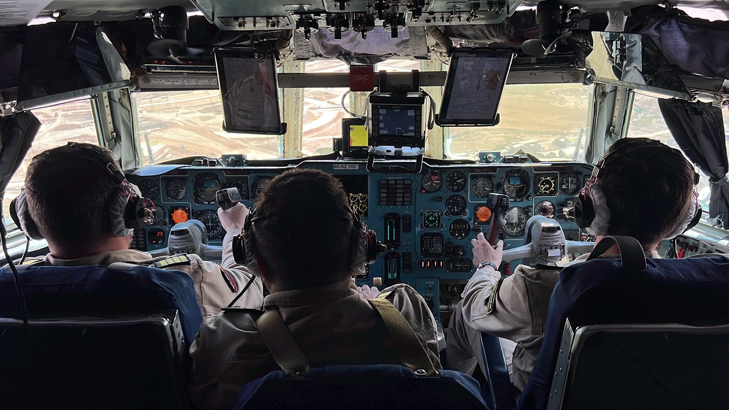 a group of people in a cockpit