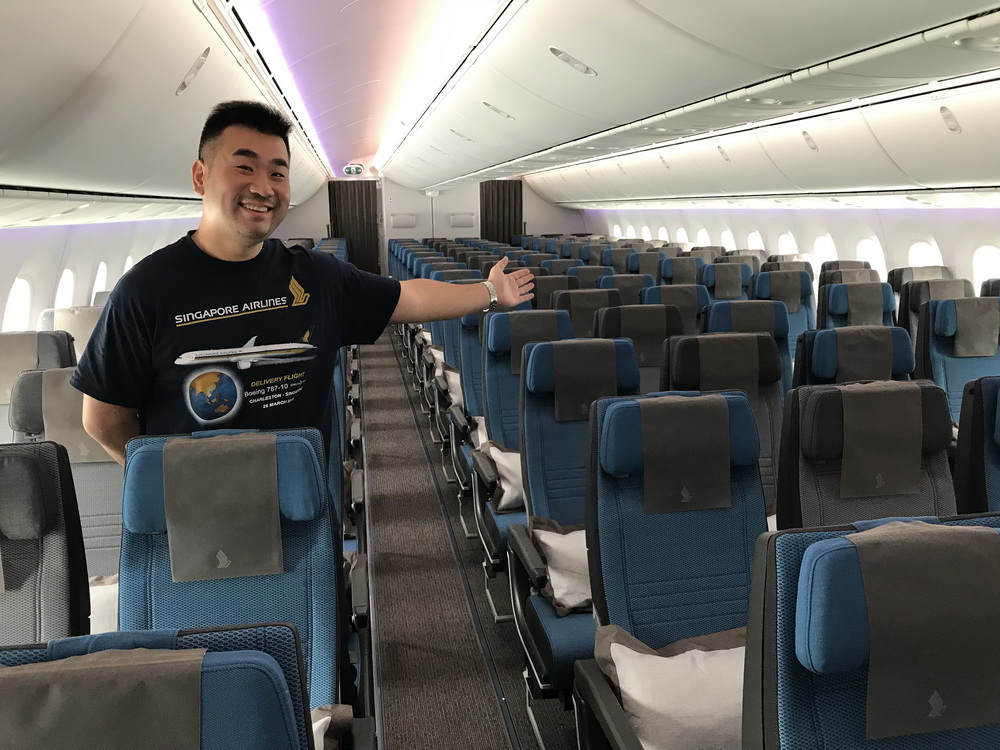 a man standing in an airplane