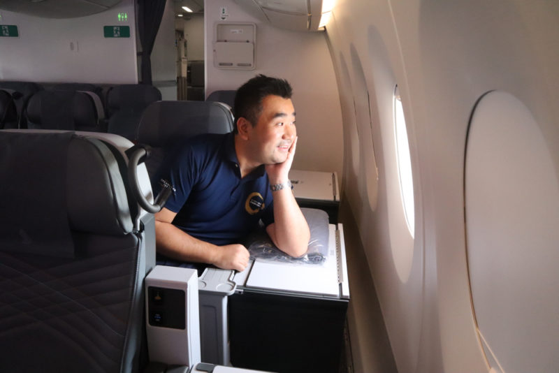 a man sitting in an airplane