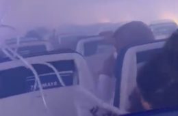 a group of people sitting in a plane