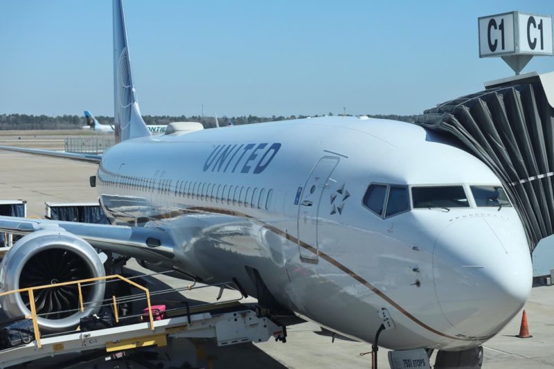 a white airplane on a tarmac