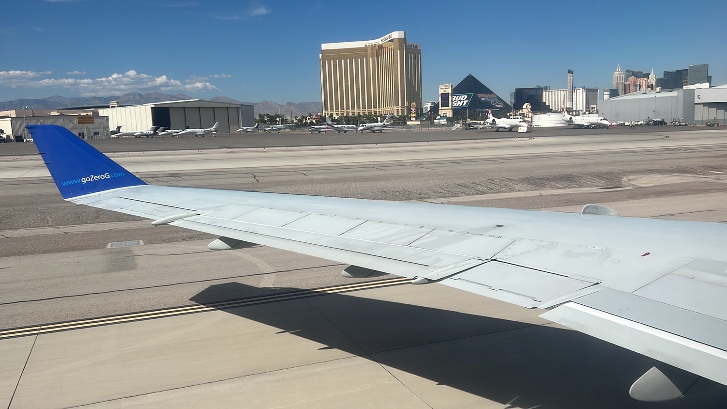 an airplane wing on a runway